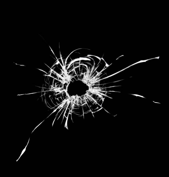 istock Texture effect shot in a window on a black background. Hole in the glass. 1360560472
