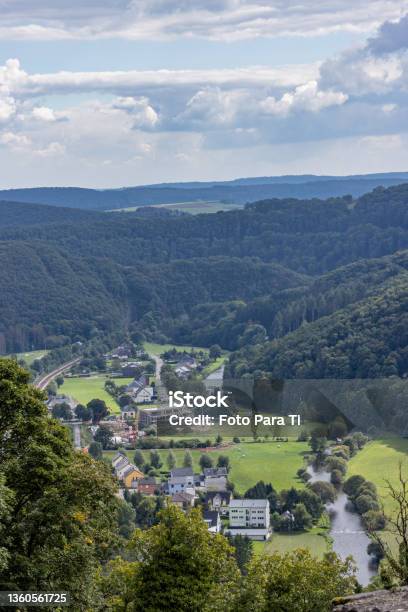 Aerial View Town Of Bourscheid With Its Houses Between A Country Road The River And Countryside Stock Photo - Download Image Now