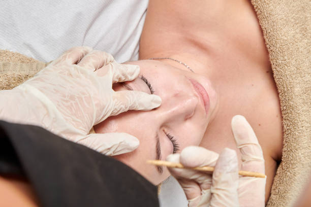 istock professional masseur doing a session of wood therapy to a client 1360561932
