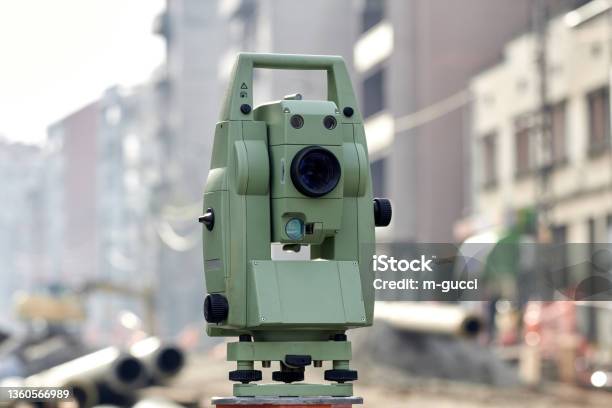 Theodolite Instrument For Measuring Land Angles During Construction Stock Photo - Download Image Now