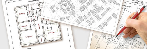 istock Updating public cadastral digital databases and information about land registry - concept image with an imaginary cadastral map of territory with buildings, roads and land parcel 1360569817