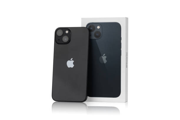 iPhone 13 Midnight against white background. New smartphone from Apple company close-up. Rostov-on-Don, Russia - December 2021. iPhone 13 Midnight against white background. New smartphone from Apple company close-up. iphone 13 photos stock pictures, royalty-free photos & images