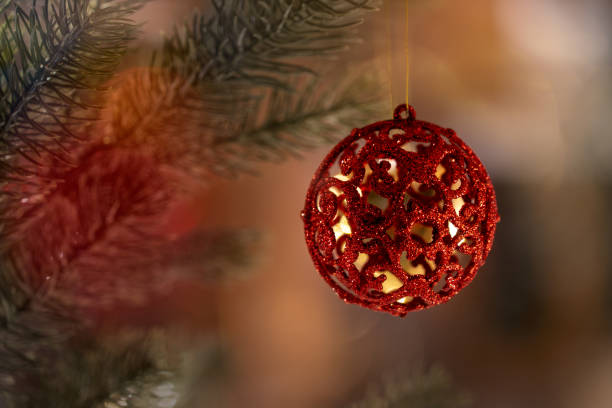 istock Christmas decoration red ball element on christmas tree 1360577751