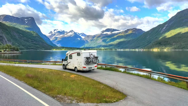 istock Norway motorhome road mountains lake 1360577808