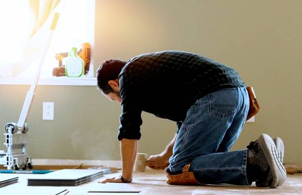 istock Installing wooden vinyl floor 1360579415