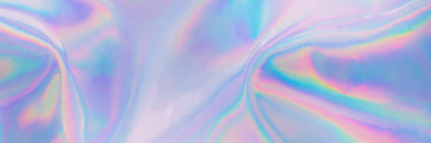 Abstract blurred rainbow pastel colored holographic banner background Blurred soft focused abstract trendy rainbow holographic banner background in 80s style. Textile texture in purple, violet, pink and mint soft pastel colors. Trendy ethereal candy colors backdrop. iridescent photos stock pictures, royalty-free photos & images