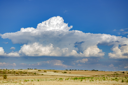 Madrid Spain. September 16, 2021. cumulus cloud over sunny field at afternoon