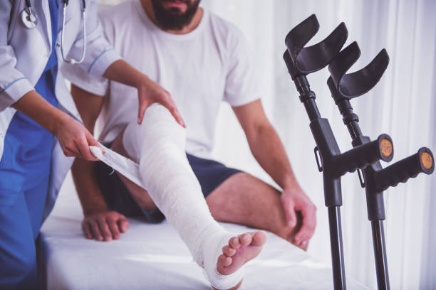 istock Injury man in doctor 1360586146