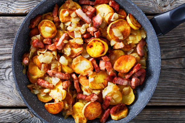 istock fried Potatoes with Bacon and onion, top view 1360587419