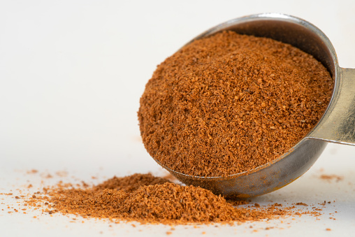 Ground Cinnamon Spilled From A Teaspoon Stock Photo Download Image ground-cinnamon-spilled-from-a-teaspoon-stock-photo-download-image