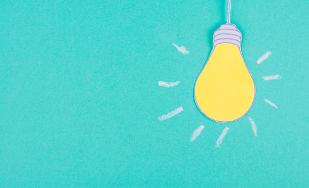 istock Light bulb concept, having a new idea, brainstorming, start up business, creative marketing 1360590816