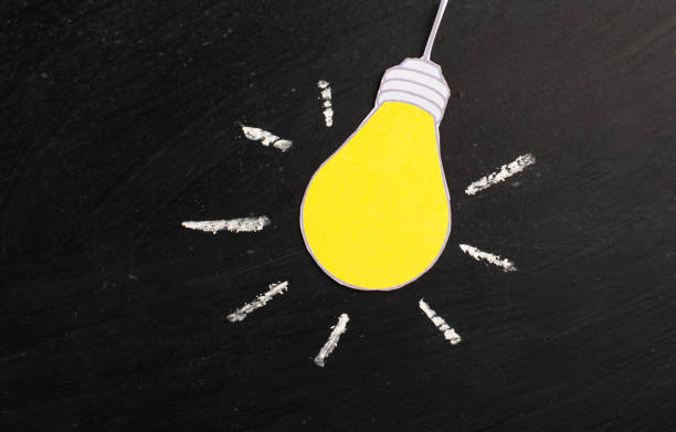 istock Light bulb concept, having a new idea, brainstorming, start up business, creative marketing 1360590819