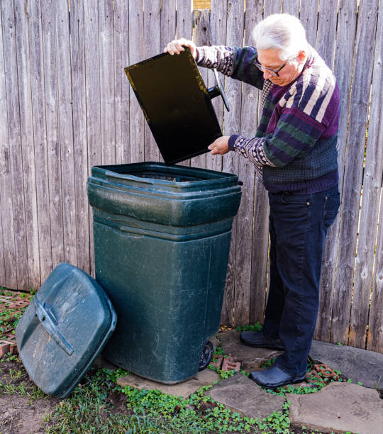 istock Senior Man Trashes a Computer Monitor 1360597291