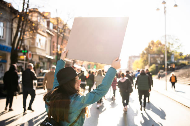 Woman Protesting On Te Streets stock photo