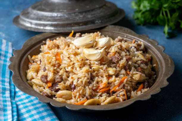 istock Traditional delicacies, Uzbek pilaf (Turkish name; Ozbek pilavi) 1360602135