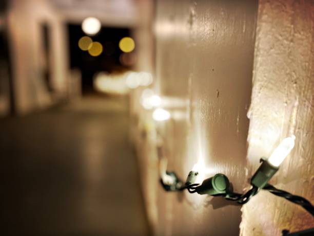 istock Close Up - Small Holiday Lights mounted on a Porch 1360619729