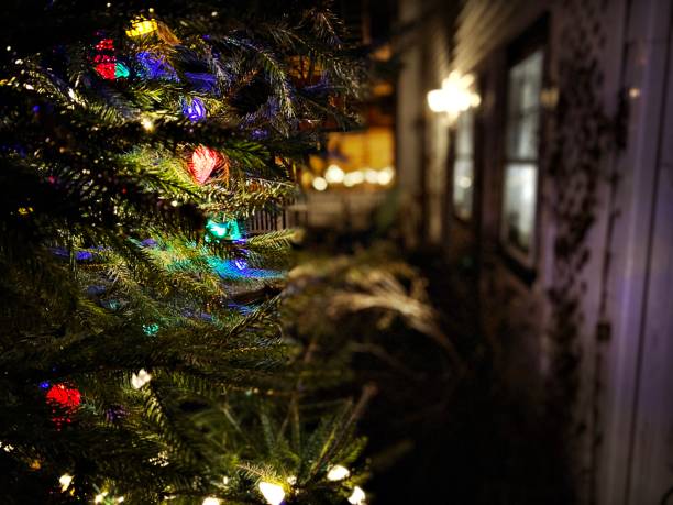 istock Close Up - Christmas Tree with Lights at Night 1360619803