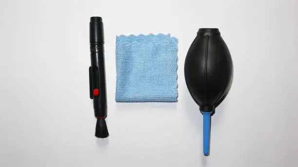 Photo of Complete package of camera cleaning tools, namely water bowler, lenspen brush and micro fiber cloth for canon eos nikon fujifilm sony samsung panasonic mirrorless and DSLR