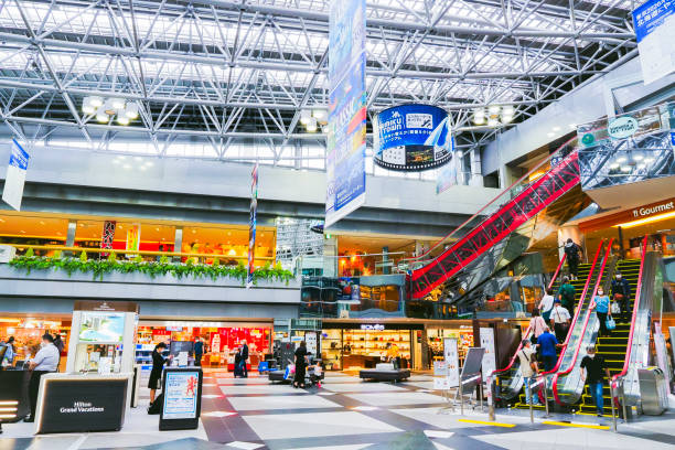hokkaido,japan - july 6, 2022 :new chitose airport with travelers and people.this airport is the largest airport in hokkaido,japan. - new chitose imagens e fotografias de stock