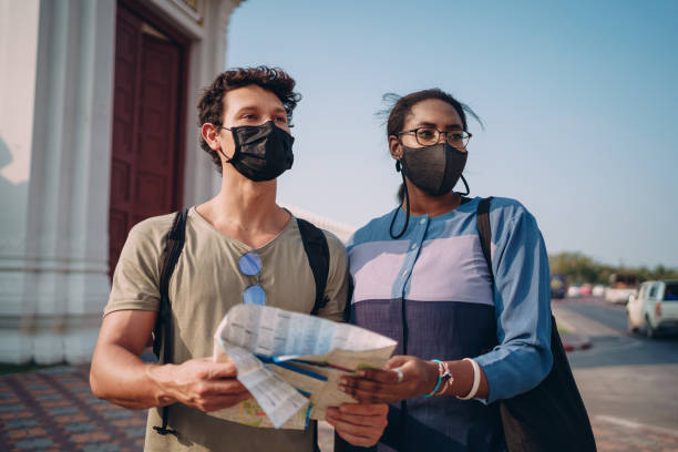 istock Tourists sightseeing the city 1360624636