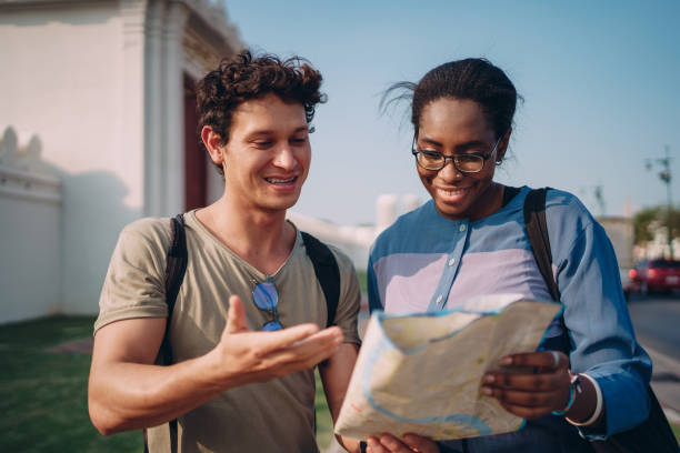 istock Tourists sightseeing the city 1360624658