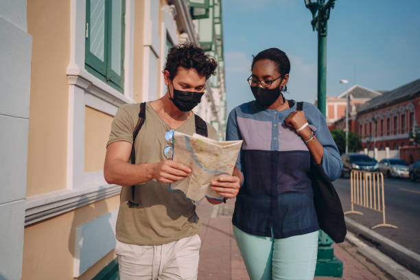 istock Tourists sightseeing the city 1360624677