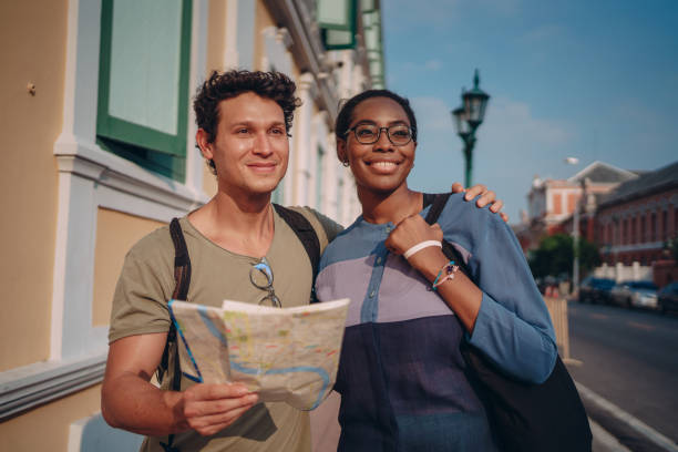 istock Tourists sightseeing the city 1360624684