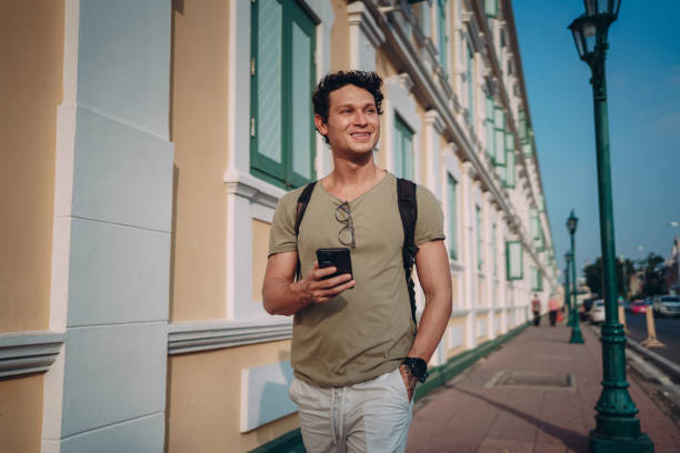 istock Man sightseeing the city 1360624689