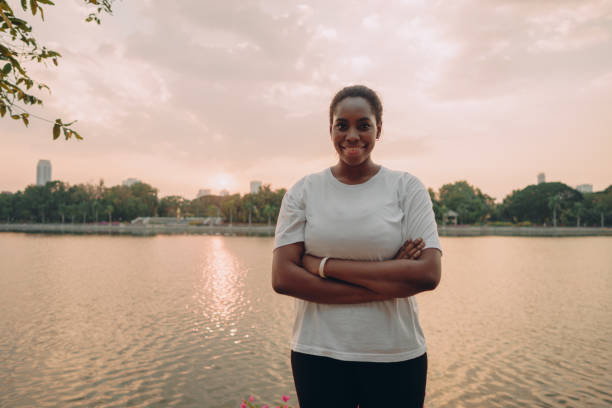 istock Smiling sporty woman 1360624758