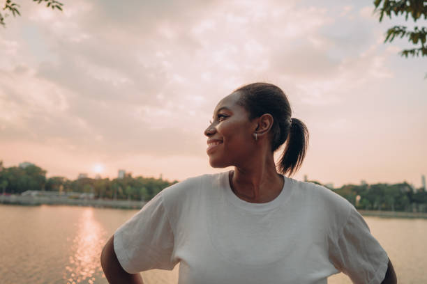 istock Smiling sporty woman 1360624769