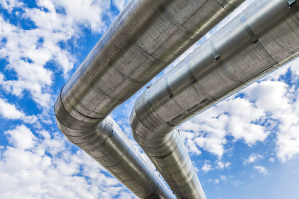 istock The main external heat supply pipes with thermal insulation against a blue sky background. 1360627767