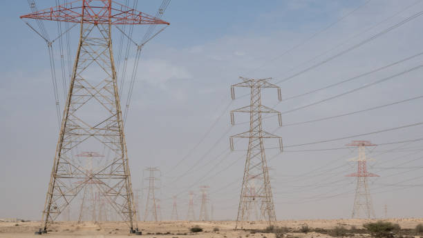 istock high voltage electric towers during sunset. 1360629426