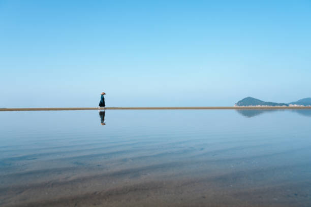 A Zen Buddhist priest photographed at Chichibugahama in Mitoyo City, Kagawa Prefecture A Zen Buddhist priest photographed at Chichibugahama in Mitoyo City, Kagawa Prefecture chan buddhism stock pictures, royalty-free photos & images