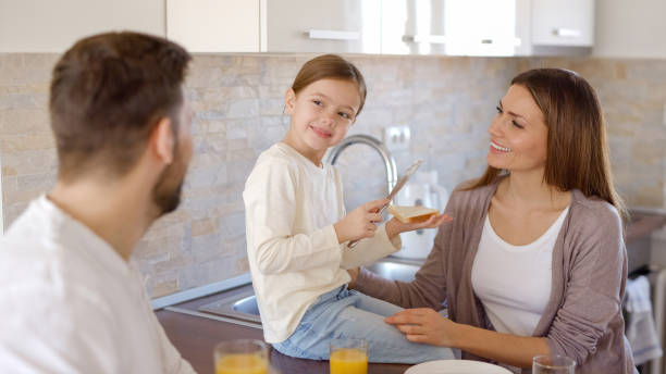 istock Nice breakfast for a happy family 1360632974