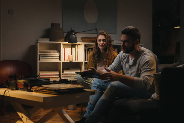 istock Friends enjoying evening at home 1360635276