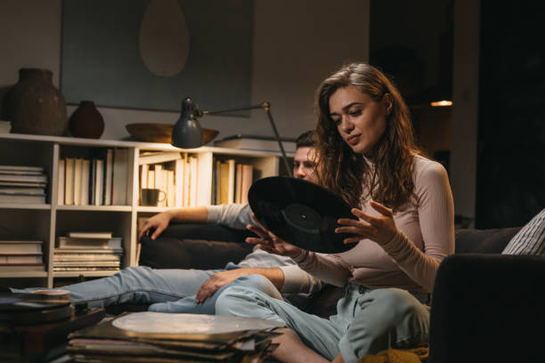 istock Friends enjoying evening at home 1360635388