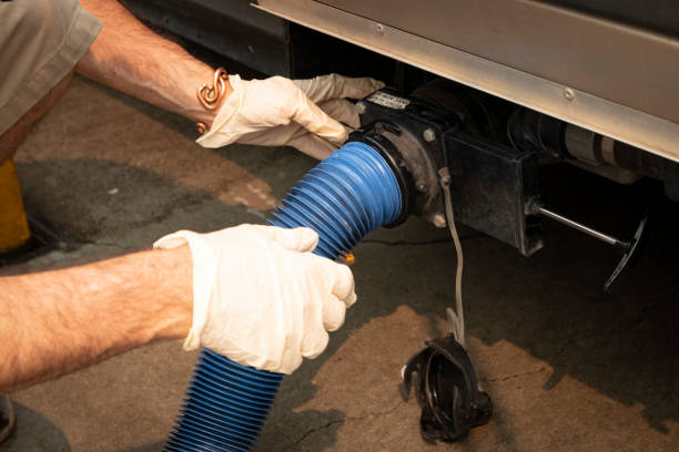 RV holding tanks sewer hose connection stock photo