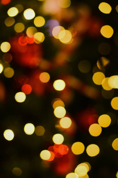 istock Bokeh lights of Christmas tree 1360644573