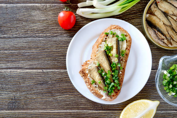 istock Tapas with sprats. Spanish traditional appetizer. Top view, overhead, flat lay 1360648163