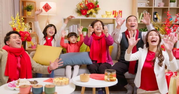 istock asian family catch something 1360651041