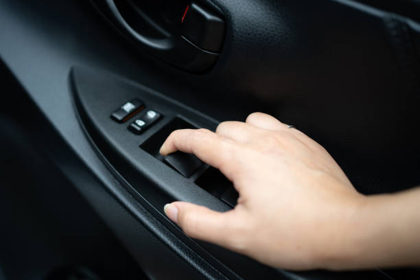 istock A portrait of windows controls and adjustments. Car window controls 1360652090