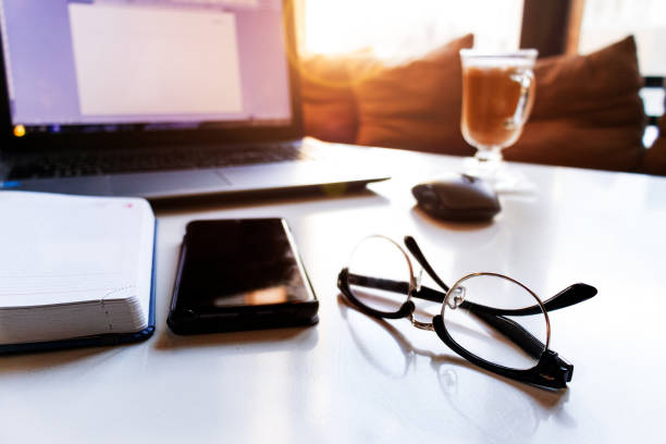 istock The glasses are on the table by the laptop. 1360655019