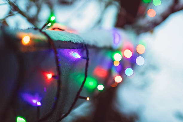 istock Glowing fairy lights for christmas on the handrail 1360657159