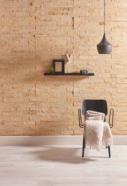 istock home interior living room with raw brick wall and wicker armchair 1360658421