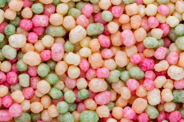 istock Thousands sprinkles tiny sugar beads for decorating cakes and desserts background. 1360658643