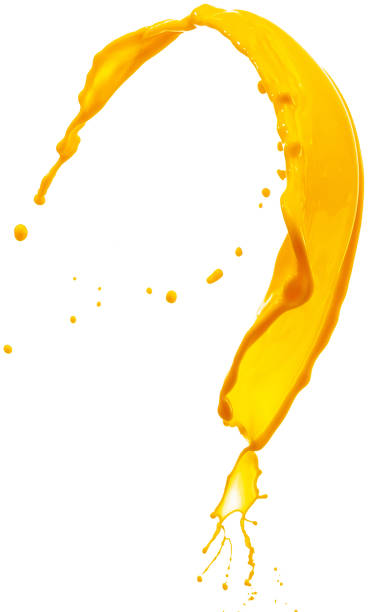 istock Close-up splash of yellow paint isolated on white background with copy space for ad, text, design 1360659361