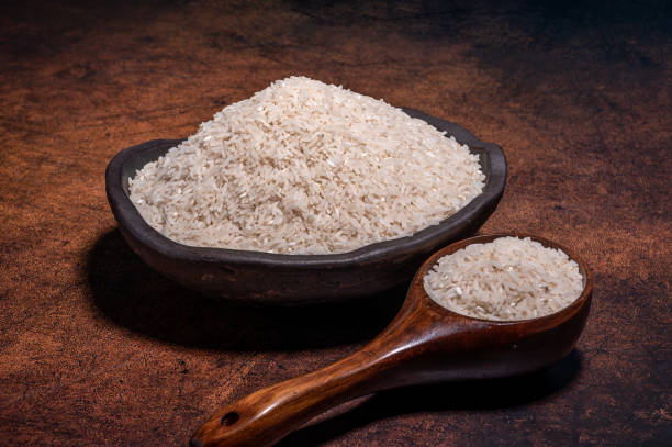 istock The white rice in the bowl is on the dark background 1360664406