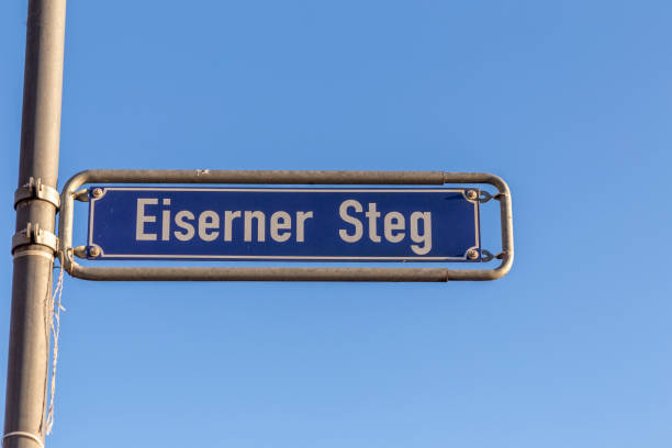 street name Eisener Steg, engl: iron footbridge in Frankfurt street name Eisener Steg, engl: iron footbridge in Frankfurt under blue sky street name sign stock pictures, royalty-free photos & images