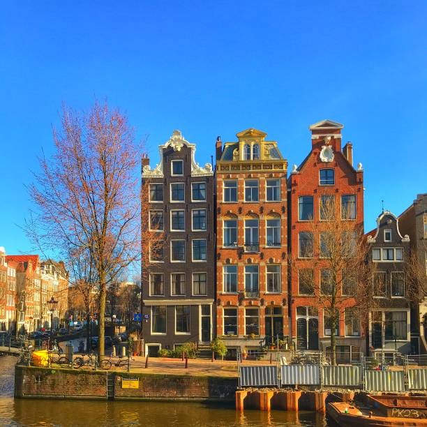 Typical Amsterdam row houses with a canal in front