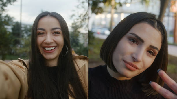 istock Two girls phone video call. Friends chat concept. Two-way conversation 1360670014
